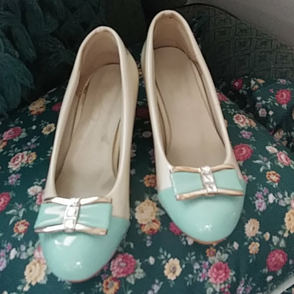 Patent leather pumps.